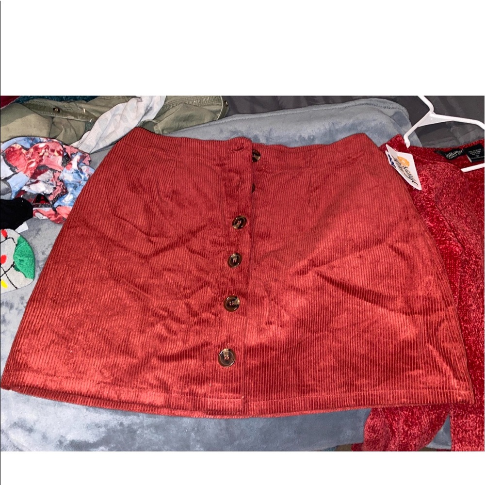 Cordory button up skirt.